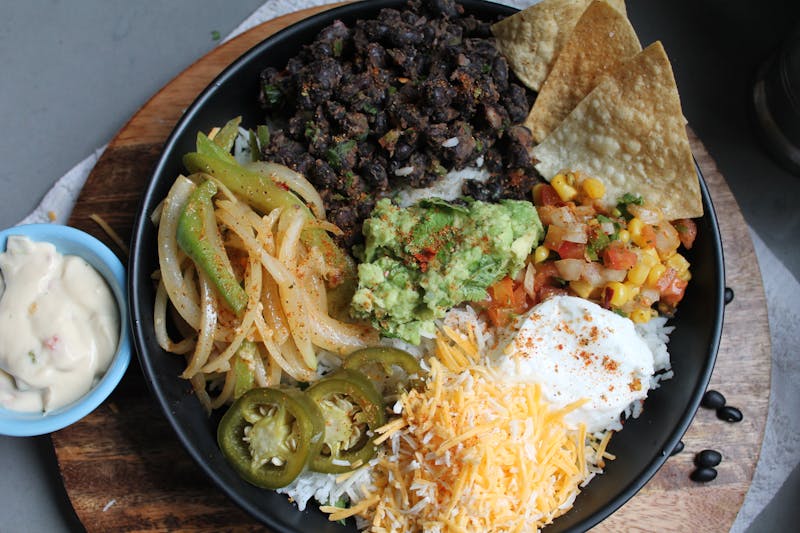 Fresh burrito bowl with vibrant toppings at Cabana Taco